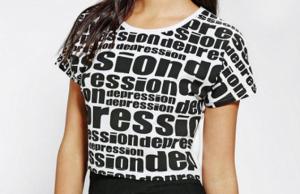 A crop top that reads 'depression' over and over and over again